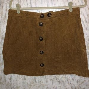 Tan corduroy button down skirt.